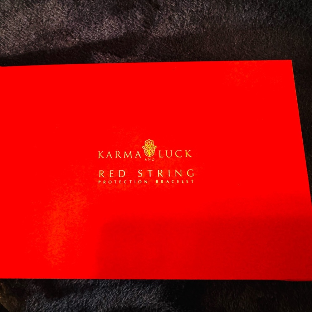 Karma and Luck men’s red string bracelet.